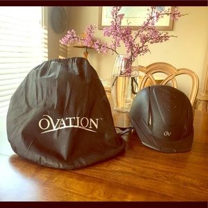 Woman’s Ovation riding helmet and carrying bag.